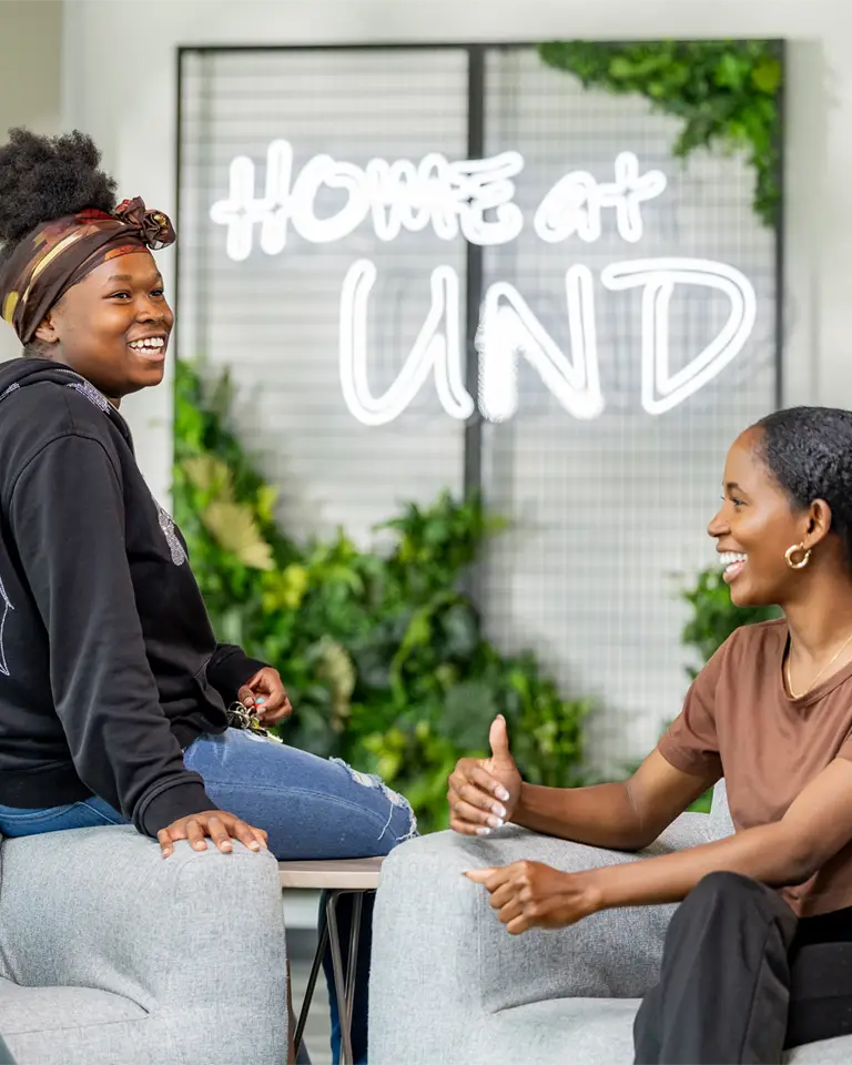 students in front of white board
