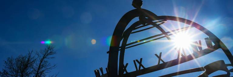 UND sundial through the trees