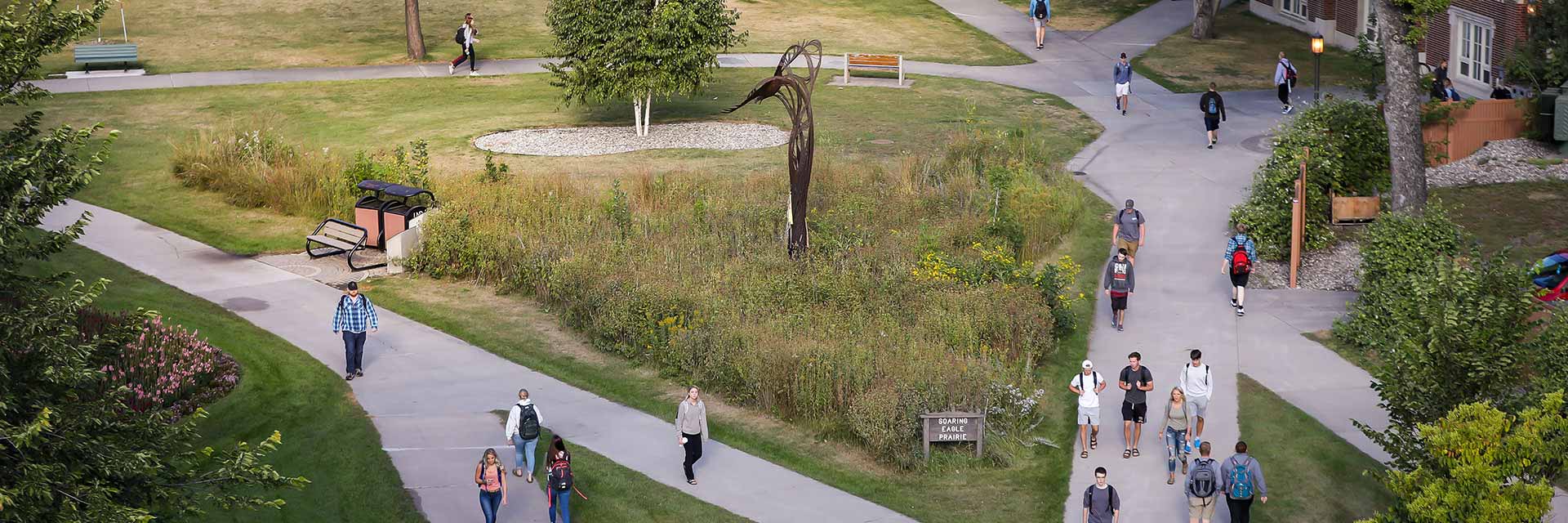 Aerial view of students walking across UND's campus