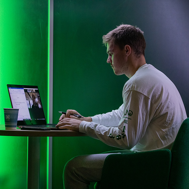 Online student working on laptop