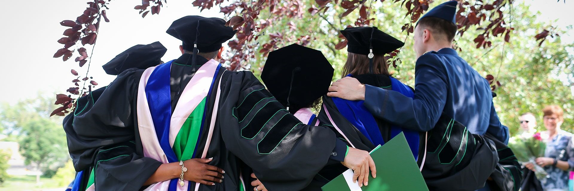 und graduates celebrate