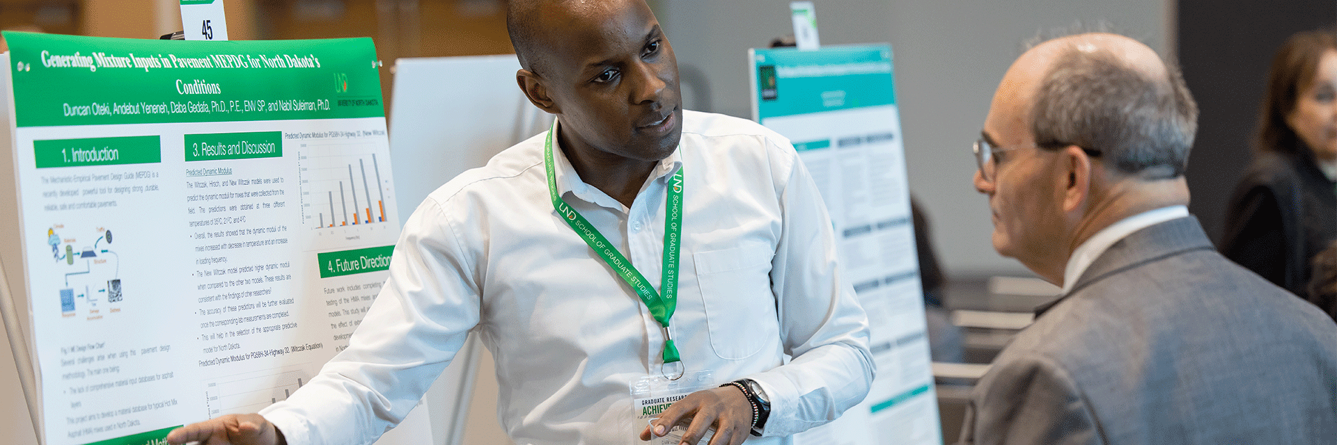 graduate student presenting at event