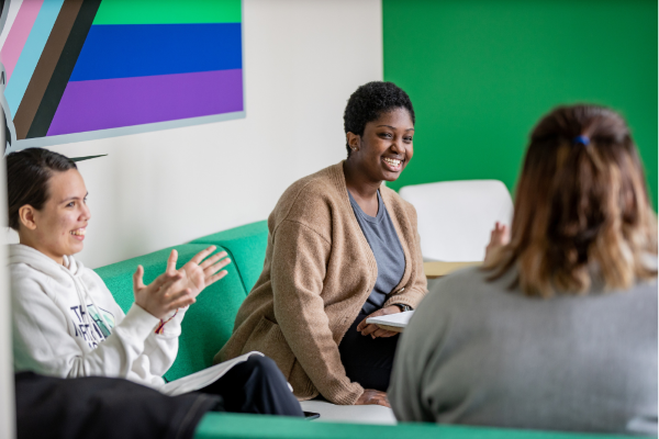 Students enjoying eachother's company at the UND Pride Center