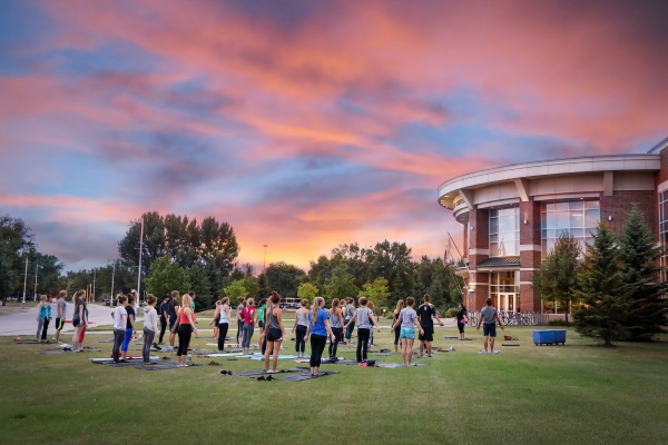 Students practicing yoga at the UND wellness center