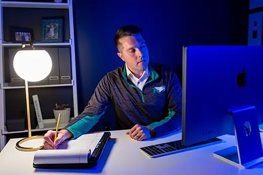 und student working at their desk