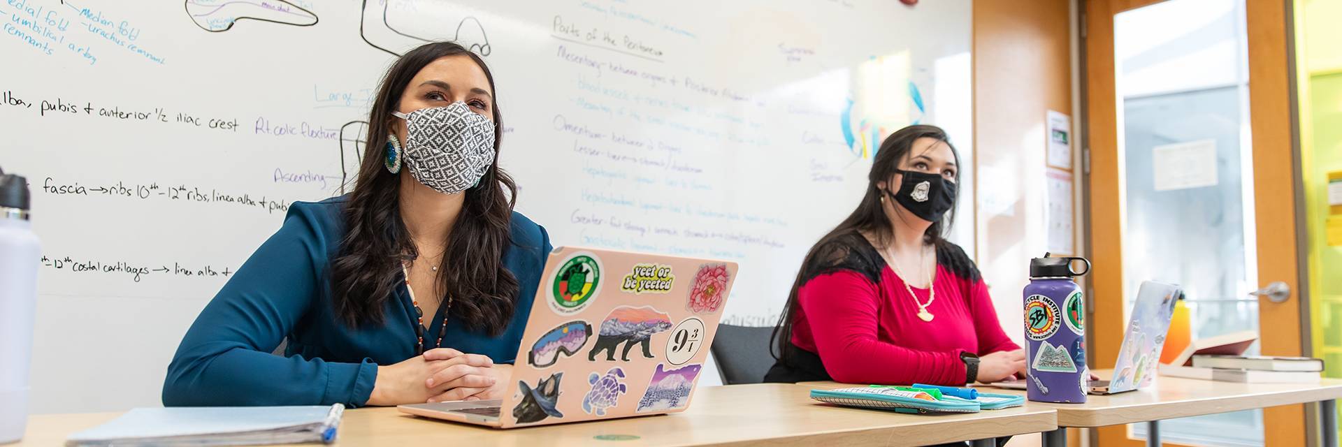Medical students observing a class lecture