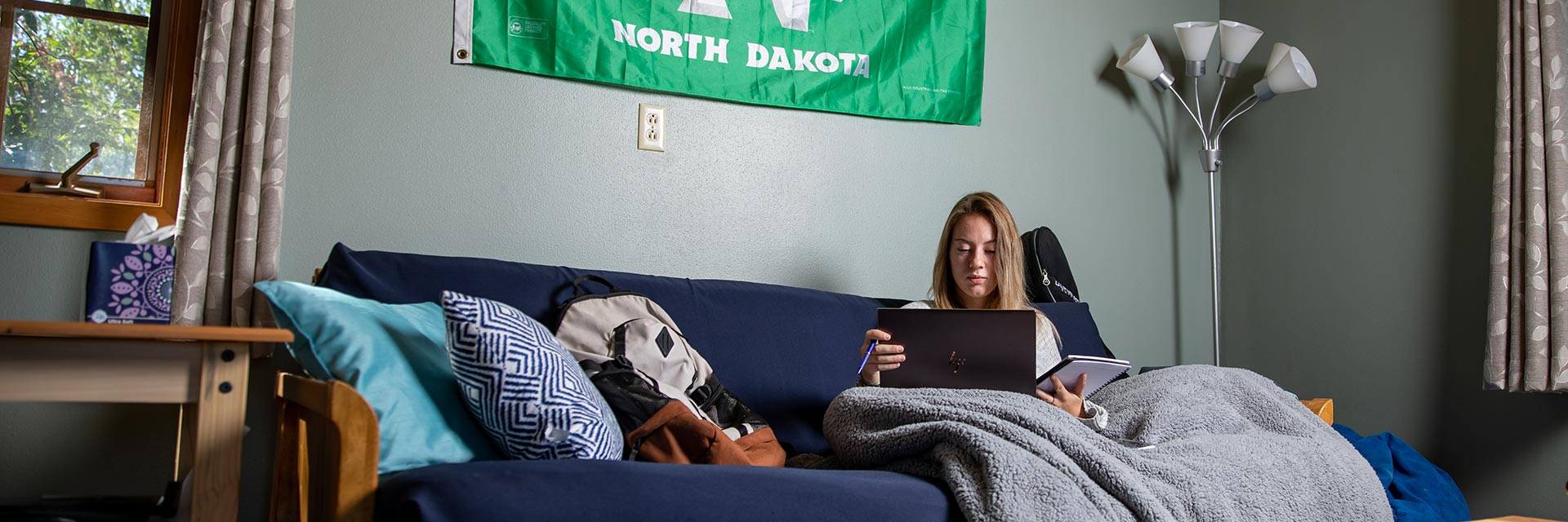 Student studying on couch