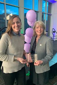 Anna Kinney and Anne Kelsch accepting the Pride Award for Collaborative Excellence