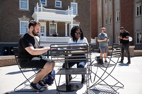 Graduate students outside Gershman Center