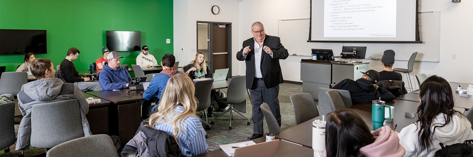 Professor Rob Warren teaching in a classroom