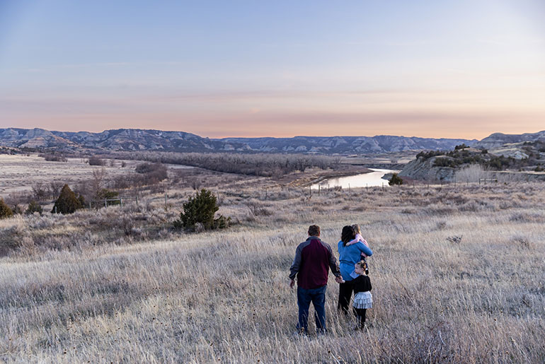logan and cassie in western north dakota badlands