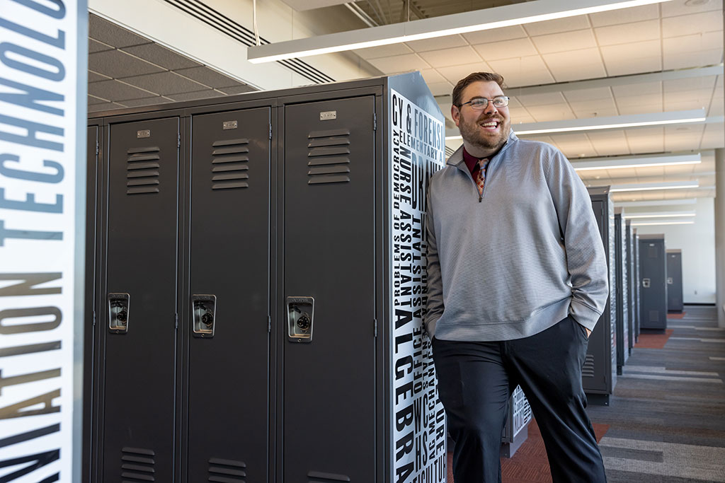 logan suter in highschool hallway