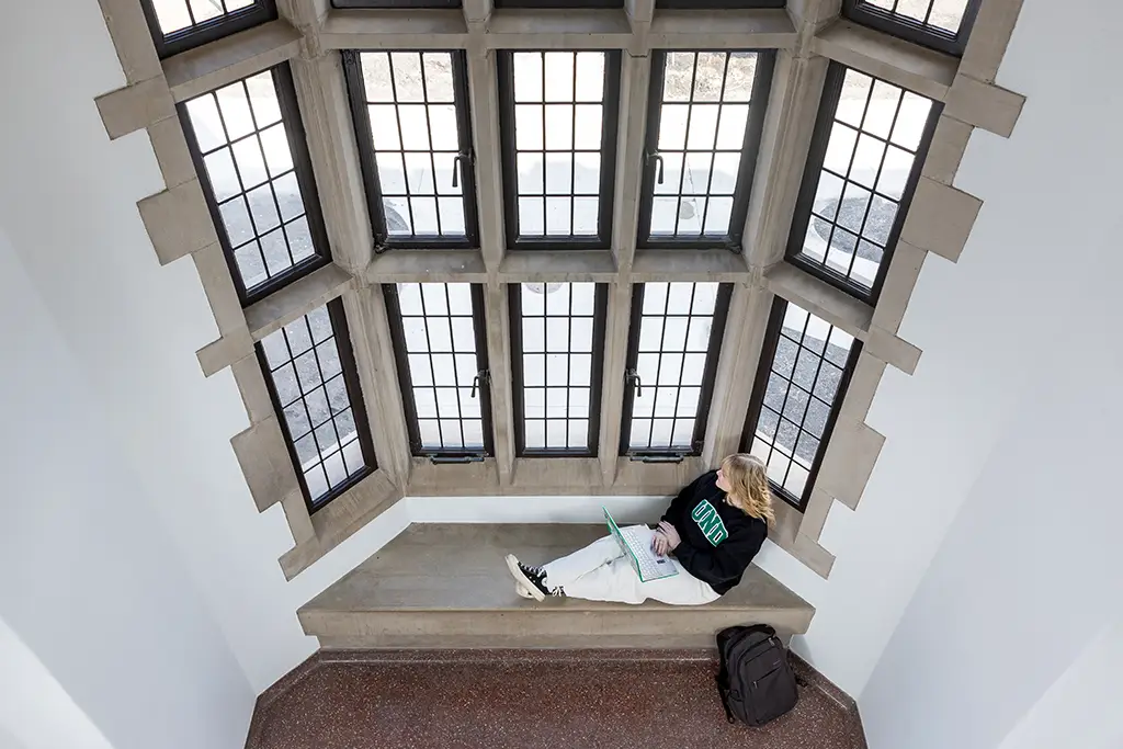 photo of Madilyn Lee in front of green screen