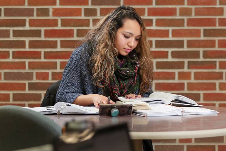 Newzaira Khan studying mobile image