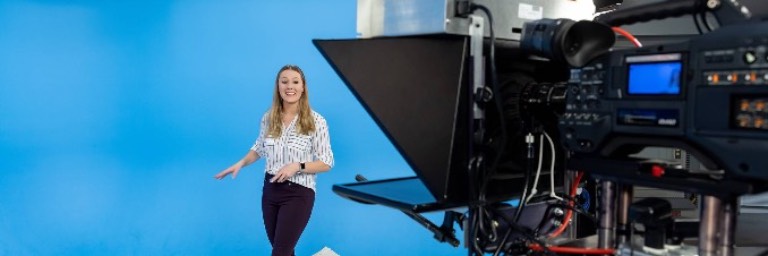 Atmospheric Sciences degree student doing newscast