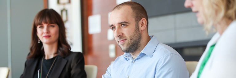 Boardroom discussion among finance students