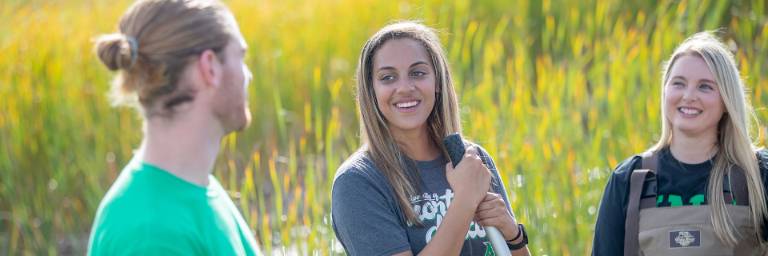 Biology students outside