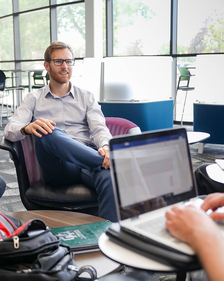 UND MBA Grad working