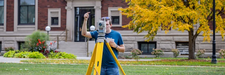 civil engineering class with surveying machine