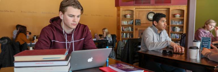 Communication student working online