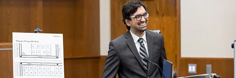 student presenting in courtroom simulation