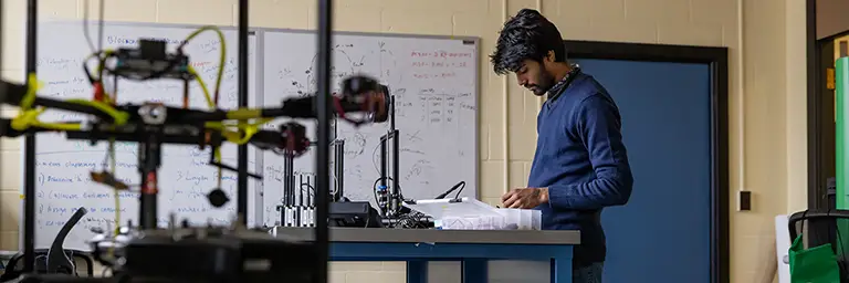 Engineer working on components