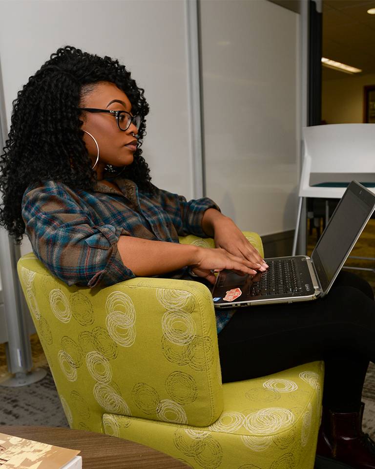 elementary education student on laptop