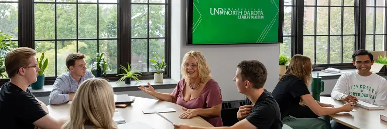 UND English Students Talking at Table