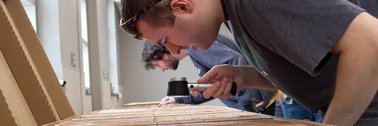 Geological Engineering Students Looking at Rock Samples
