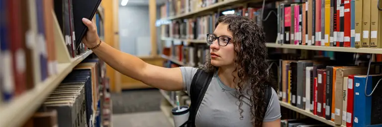 UND Student in Library