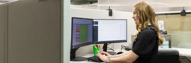 UND Human Resources Major Working at Internship on Computer