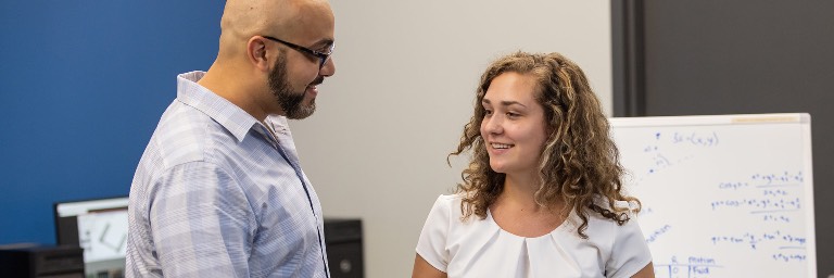 Teacher working with colleague