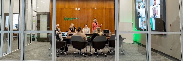 management degree students in hybrid class