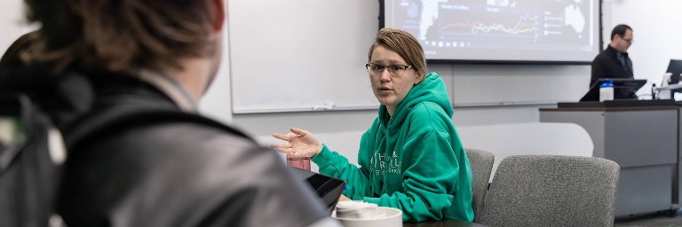 political science degree students talking in class