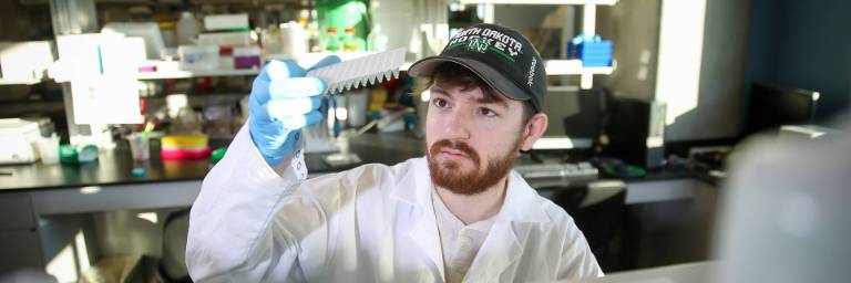 student working in lab