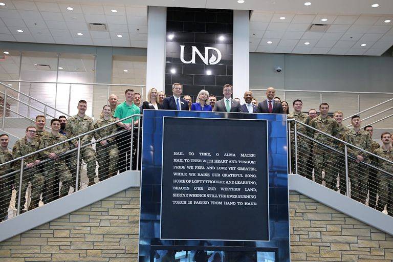 Leadership and cadets on staircase