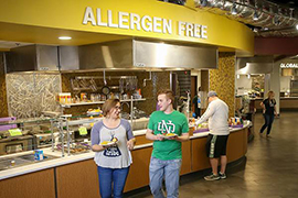 students walking in front of the allergen concept