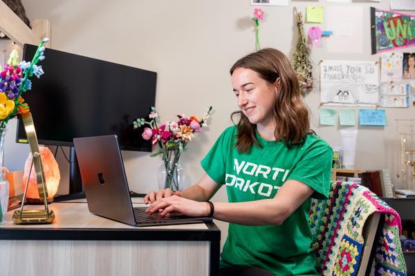 student looking at computer screen